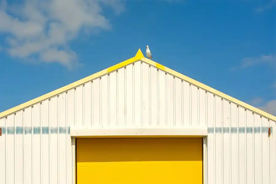 Openslaande garagedeuren VS traditionele roldeur garages